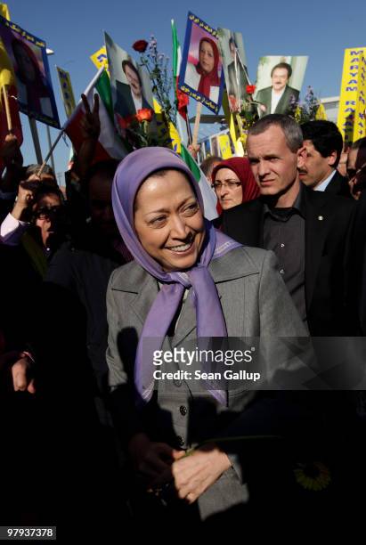 Maryam Rajavi, president of the National Council of Resistance of Iran, greets several hundred Iranian expatriates who had gathered to welcome her...