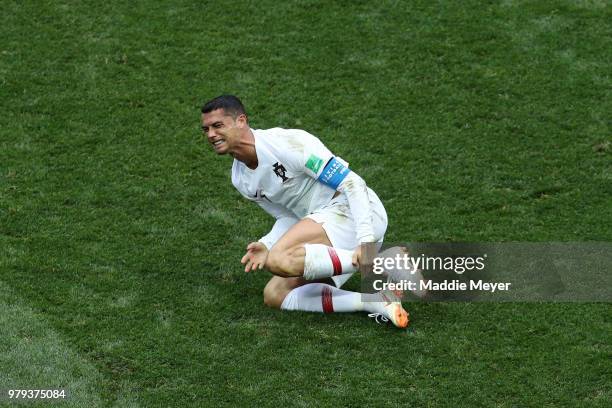 Cristiano Ronaldo of Portugal goes down injured during the 2018 FIFA World Cup Russia group B match between Portugal and Morocco at Luzhniki Stadium...