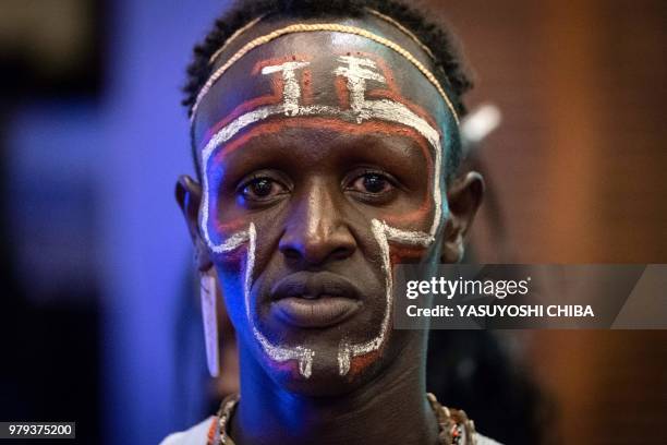 Dancer of El-molo tribe performs during the launching ceremony of the 11th Marsabit-Lake Turkana Cultural Festival in Nairobi, Kenya, on June 20,...