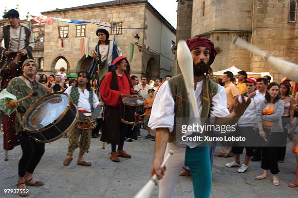 Street musicians and acrobats Feira Franca ´ Medieval festival in old and historic city of Betanzos, Galicia region, 9th July 2005