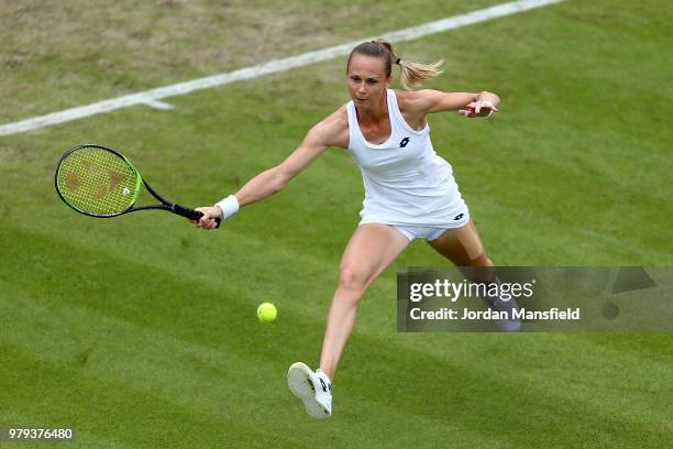 Magdalena Rybarikova of Slovakia reaches for a forehand during her Round of 16 match against Kristina Mladenovic of France during Day Five of the...
