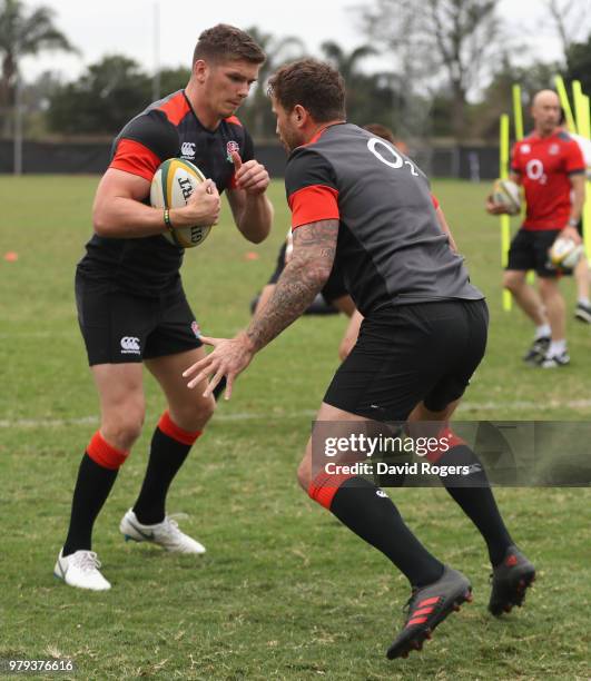 Owen Farrell takes on Danny Cipriani during the England training session at Kings Park Stadium on June 20, 2018 in Durban, South Africa.