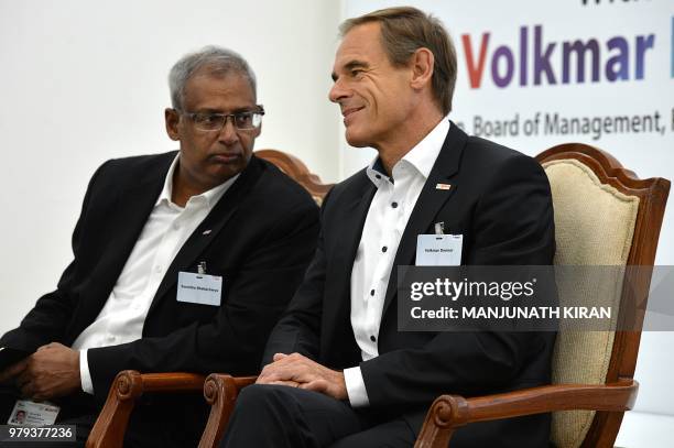 Dr Volkmar Denner, chairman of the board of management of Robert Bosch GmbH addresses a press conference at the Bosch facility in Bangalore on June...