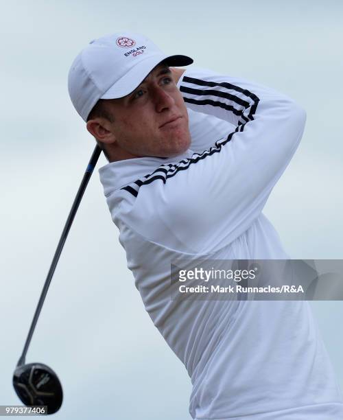 Benjamin Jones of Northamptonshire County plays his tee shot to the 13th hole during the third day of The Amateur Championship at Royal Aberdeen on...