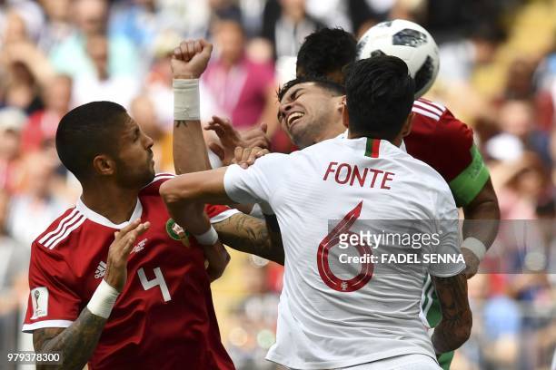 Portugal's defender Jose Fonte and Morocco's defender Manuel Da Costa vie for the ball with other teammates during the Russia 2018 World Cup Group B...
