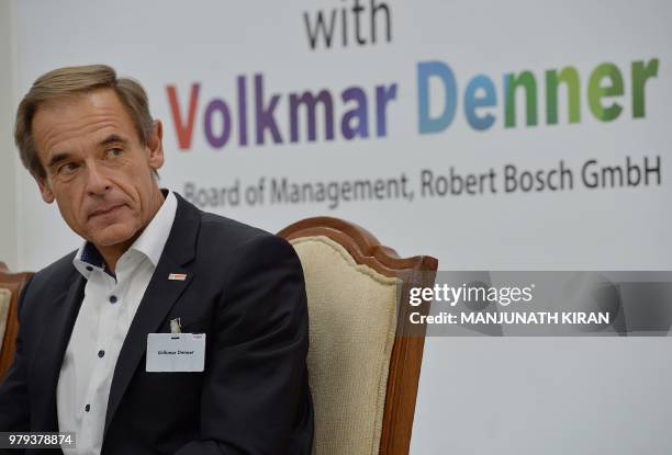 Dr Volkmar Denner, chairman of the board of management of Robert Bosch GmbH addresses a press conference at the Bosch facility in Bangalore on June...