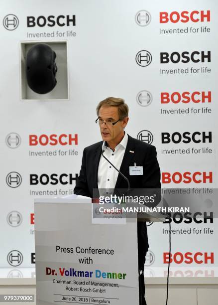 Dr Volkmar Denner, chairman of the board of management of Robert Bosch GmbH addresses a press conference at the Bosch facility in Bangalore on June...