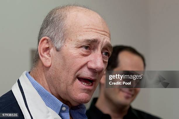 Israel's former Prime Minister Ehud Olmert speaks in the courtroom during his trial at the District Court on March 22, 2010 in Jerusalem, Israel....