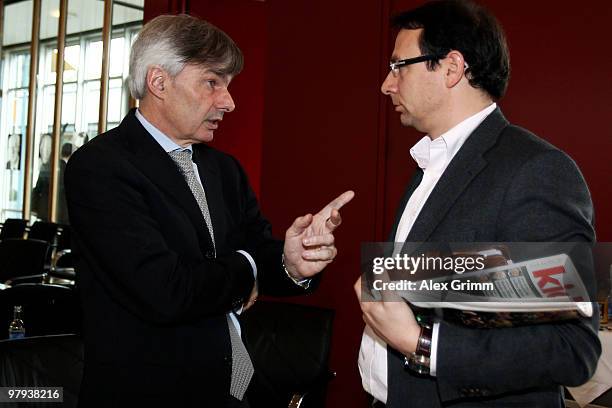 Michael Meier , manager of 1. FC Koeln, discusses with Martin Bader, manager of 1. FC Nuernberg, before the process against 1.FC Koeln at the court...