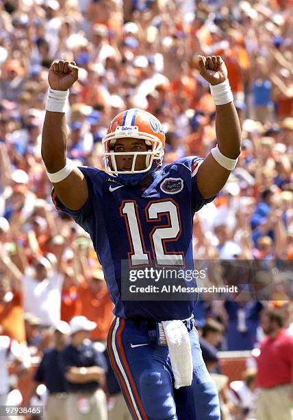 Florida quarterback Chris Leak signals a first-half touchdown Saturday, October 4, 2003 at Ben Hill Griffin Stadium, Gainesville. Old Miss defeated...