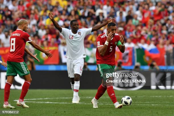 Morocco's defender Mehdi Benatia reacts after failing to score a goal during the Russia 2018 World Cup Group B football match between Portugal and...