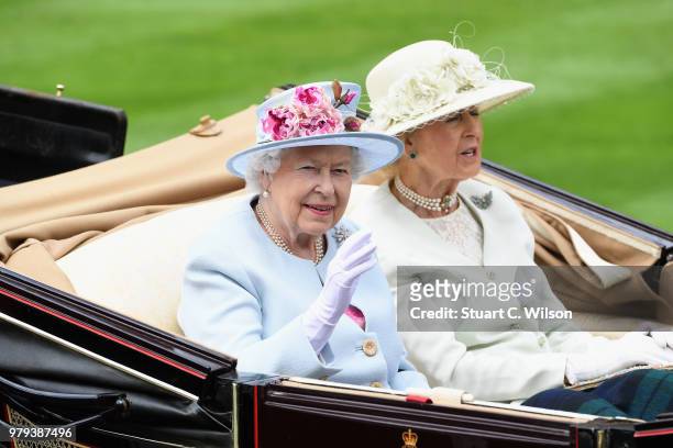 Queen Elizabeth II and Princess Alexandra, The Honourable Lady Ogilvy arrive in the royal procession on day 2 of Royal Ascot at Ascot Racecourse on...