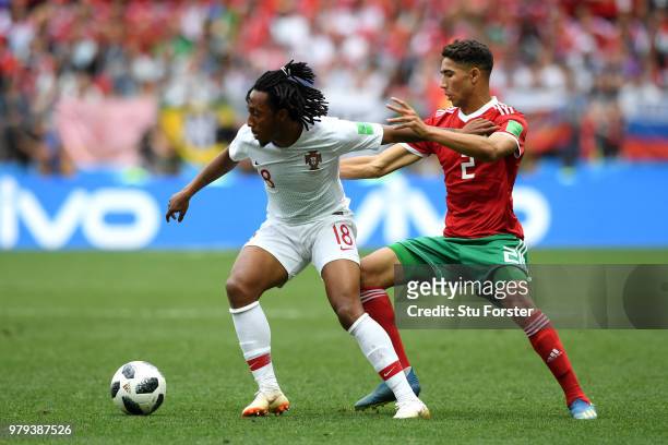 Gelson Martins of Portugal is challenged by Achraf Hakimi of Morocco during the 2018 FIFA World Cup Russia group B match between Portugal and Morocco...