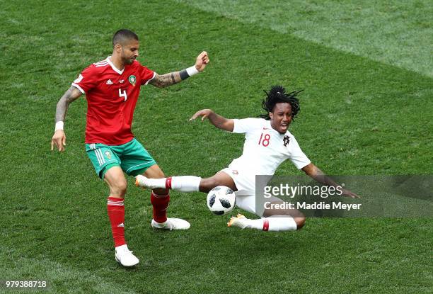 Gelson Martins of Portugal is challenged by Manuel Da Costa of Morocco during the 2018 FIFA World Cup Russia group B match between Portugal and...