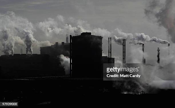 Steam and smoke rises from the steel works on March 22, 2010 in Port Talbot, Wales. According to report by a cross party group of MPs air pollution...
