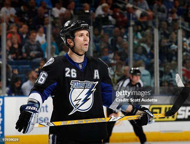 Martin St. Louis of the Tampa Bay Lightning prepares for the face-off against the Buffalo Sabres at the St. Pete Times Forum on March 18, 2010 in...