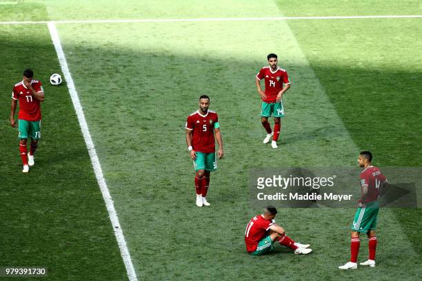 Morocco players show their dejection following the 2018 FIFA World Cup Russia group B match between Portugal and Morocco at Luzhniki Stadium on June...