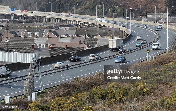 Vehicles pass along the elevated M4 motorway on March 22, 2010 in Port Talbot, Wales. According to report by a cross party group of MPs air pollution...