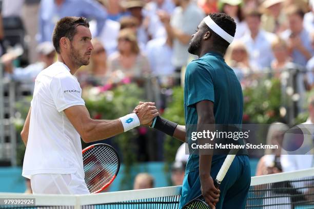 Frances Tiafoe of The USA and Leonardo Mayer of Argentina shake hands following their match on Day Three of the Fever-Tree Championships at Queens...