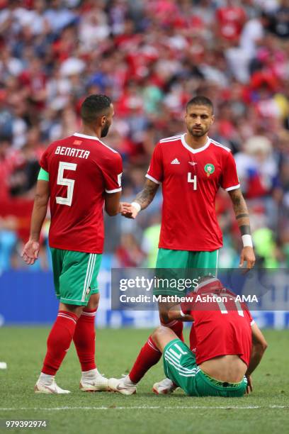 Mehdi Benatia, Manuel Da Costa and Faycal Fajr of Morocco look dejected at the end of the 2018 FIFA World Cup Russia group B match between Portugal...