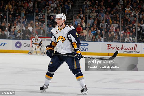 Toni Lydman of the Buffalo Sabres defends against the Tampa Bay Lightning at the St. Pete Times Forum on March 18, 2010 in Tampa, Florida.