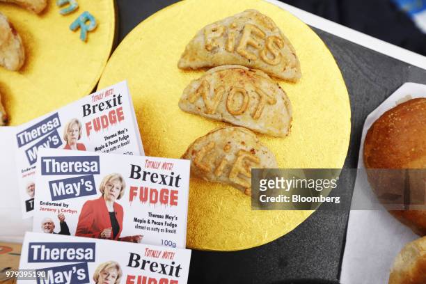 An afternoon tea, including cornish pasties with 'Pies Not Lies' decoration and 'Brexit fudge', sits on display during a Pro-European Union and...