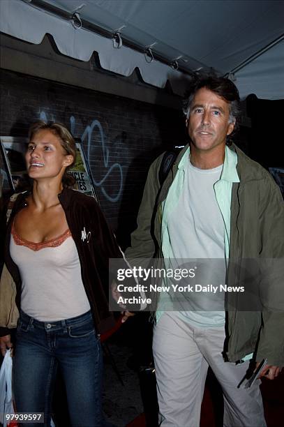 Christopher Lawford and friend Lana Antonova arrive at the Loews Cineplex 19th St. East Theater for the New York premiere of "Motorcycle Diaries."