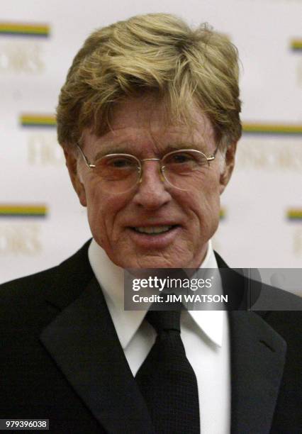 Actor, director and producer Robert Redford looks on as he arrives for the annual Kennedy Center Honors dinner at the State Department in Washington...