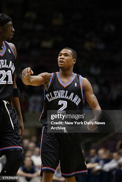 Cleveland Cavaliers' Dajuan Wagner speaks to Darius Miles during a break in the action against the New Jersey Nets at Continental Airlines Arena. The...