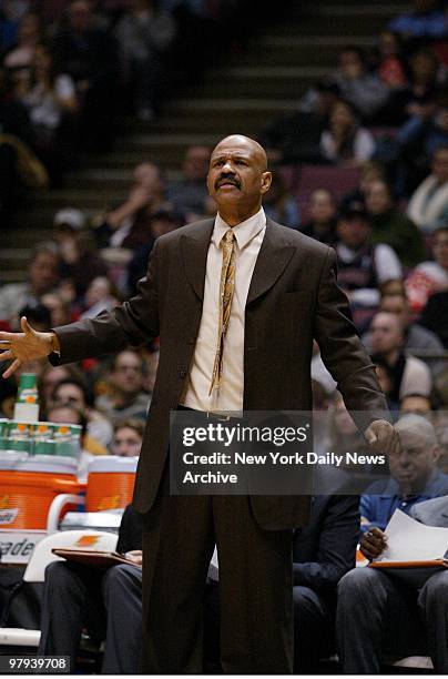 Cleveland Cavaliers' head coach John Lucas watches as his team takes on the New Jersey Nets at Continental Airlines Arena. The Nets went on to beat...