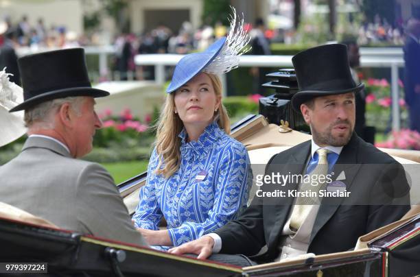 Prince Charles, Prince of Wales, Autumn Phillips and Peter Phillips arrive in the royal procession on day 2 of Royal Ascot at Ascot Racecourse on...