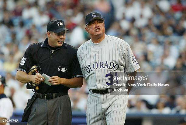 Colorado Rockies' manager Clint Hurdle has words with home plate umpire Tim Timmons during a game against the New York Yankees at Yankee Stadium. The...