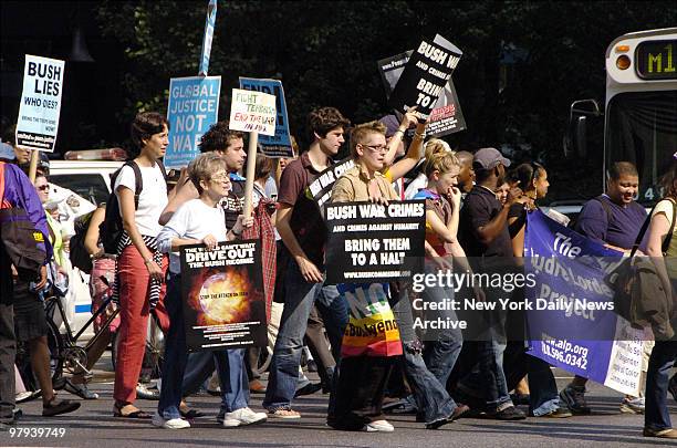 Protesters march along E. 47th St. As President George Bush addresses the General Assembly at the United Nations. The march ended at Dag Hammarskjold...