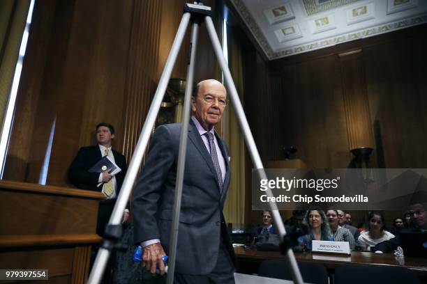Secretary of Commerce Wilbur Ross arrives before testifying to the Senate Finance Committee in the Dirksen Senate Office Building on Capitol Hill...