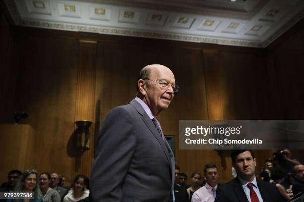 Secretary of Commerce Wilbur Ross arrives before testifying to the Senate Finance Committee in the Dirksen Senate Office Building on Capitol Hill...