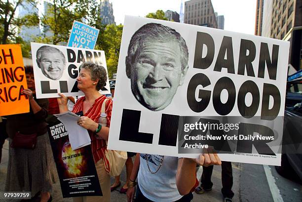 Protesters march up Sixth Ave. As President George Bush addresses the General Assembly at the United Nations. The march ended at Dag Hammarskjold...