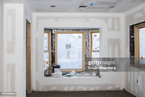 Hurricane-rated windows are seen during construction of a home designed to withstand extreme weather in the Breezy Point neighborhood of the Queens...