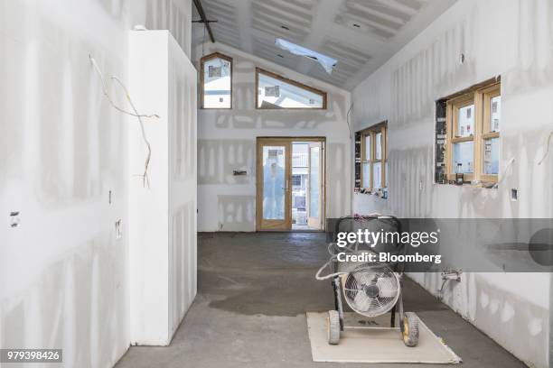 Hurricane-rated windows and a hurricane-proof door are seen during construction of a home designed to withstand extreme weather in the Breezy Point...