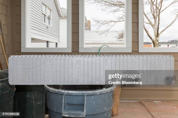 Insulated Concrete Form sits on a trash bin during construction of a home designed to withstand extreme weather in the Breezy Point neighborhood of...