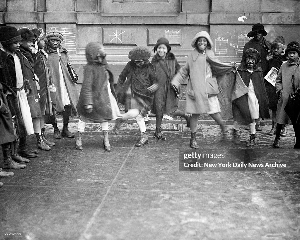 Youngsters play in Harlem street in the 1920's.