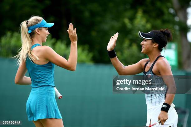 Heather Watson and Katie Boulter of Great Britain celebrate a point during their Lyudmyla Kichenok of the Ukraine and Alla Kudryavtseva of Russia...