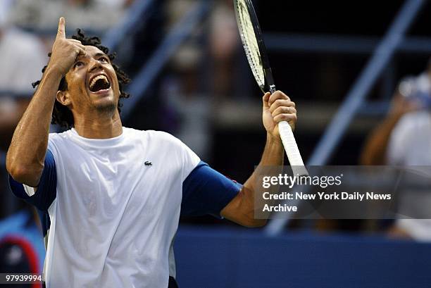 Younes El Aynaoui of Morocco celebrates scoring a point during match against Rafael Nadal of Spain at Louis Armstrong Stadium in the second round of...