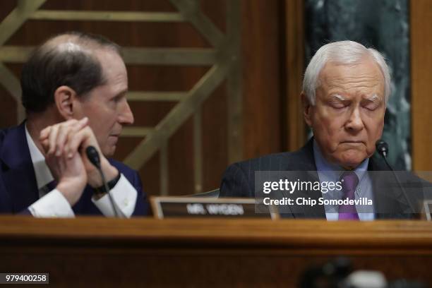 Senate Finance Committee Chairman Orrin Hatch and ranking member Sen. Ron Wyden hear testimony from U.S. Secretary of Commerce Wilbur Ross in the...