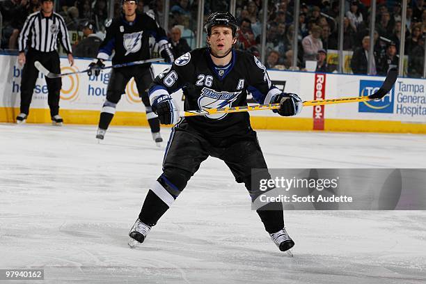 Martin St. Louis of the Tampa Bay Lightning waits for the pass against the Buffalo Sabres at the St. Pete Times Forum on March 18, 2010 in Tampa,...