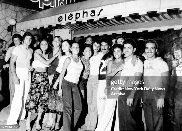 Young people expressing their delight at Elphas disco of the capture of serial killer David Berkowitz. Sal Lupo was wounded by the killer as he and...