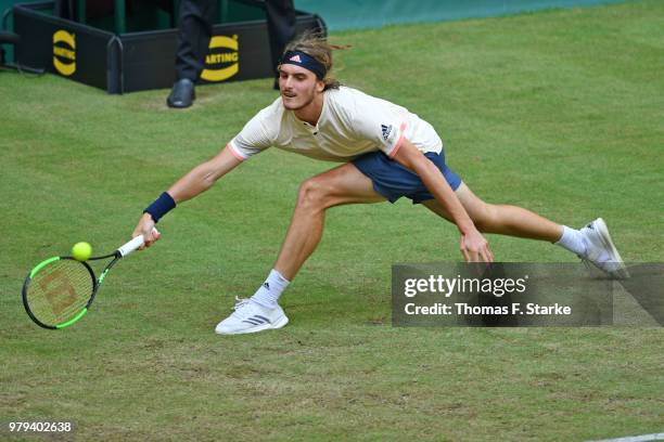 Stefanos Tsitsipas of Greece plays a forehand in his match against Denis Kudla of the United States during day three of the Gerry Weber Open at Gerry...