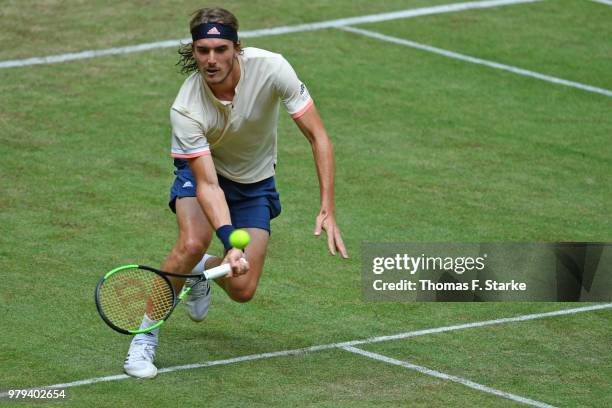 Stefanos Tsitsipas of Greece plays a forehand in his match against Denis Kudla of the United States during day three of the Gerry Weber Open at Gerry...
