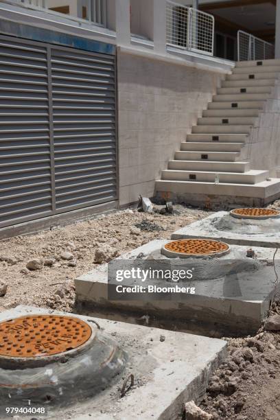 Gravity wells are seen during construction of the 121 Marina residential condominium complex designed to withstand extreme weather at Ocean Reef Club...