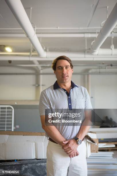 Eric Soulavy, founder of Blue Jay Capital, stands for a photograph at the 121 Marina residential condominium complex designed to withstand extreme...