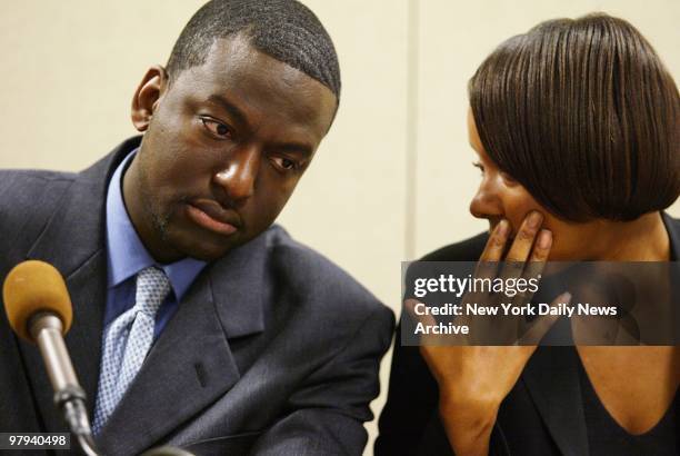 Yusef Salaam listens to his sister, Aisha, during news conference at the City Council offices on Broadway. Salaam, one of the five men convicted in...